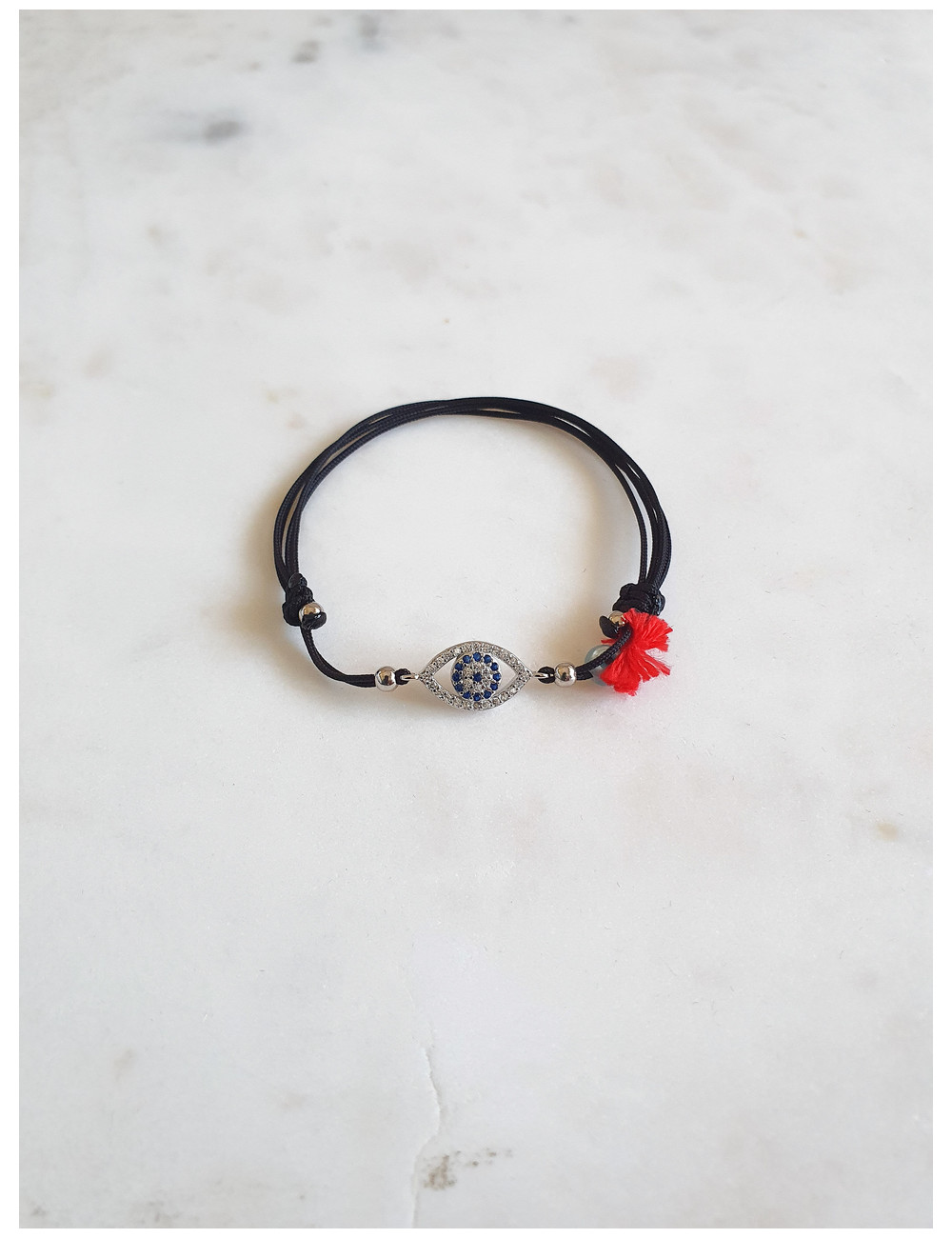 PULSEIRA EM FIO SEDA OLHO PRATA