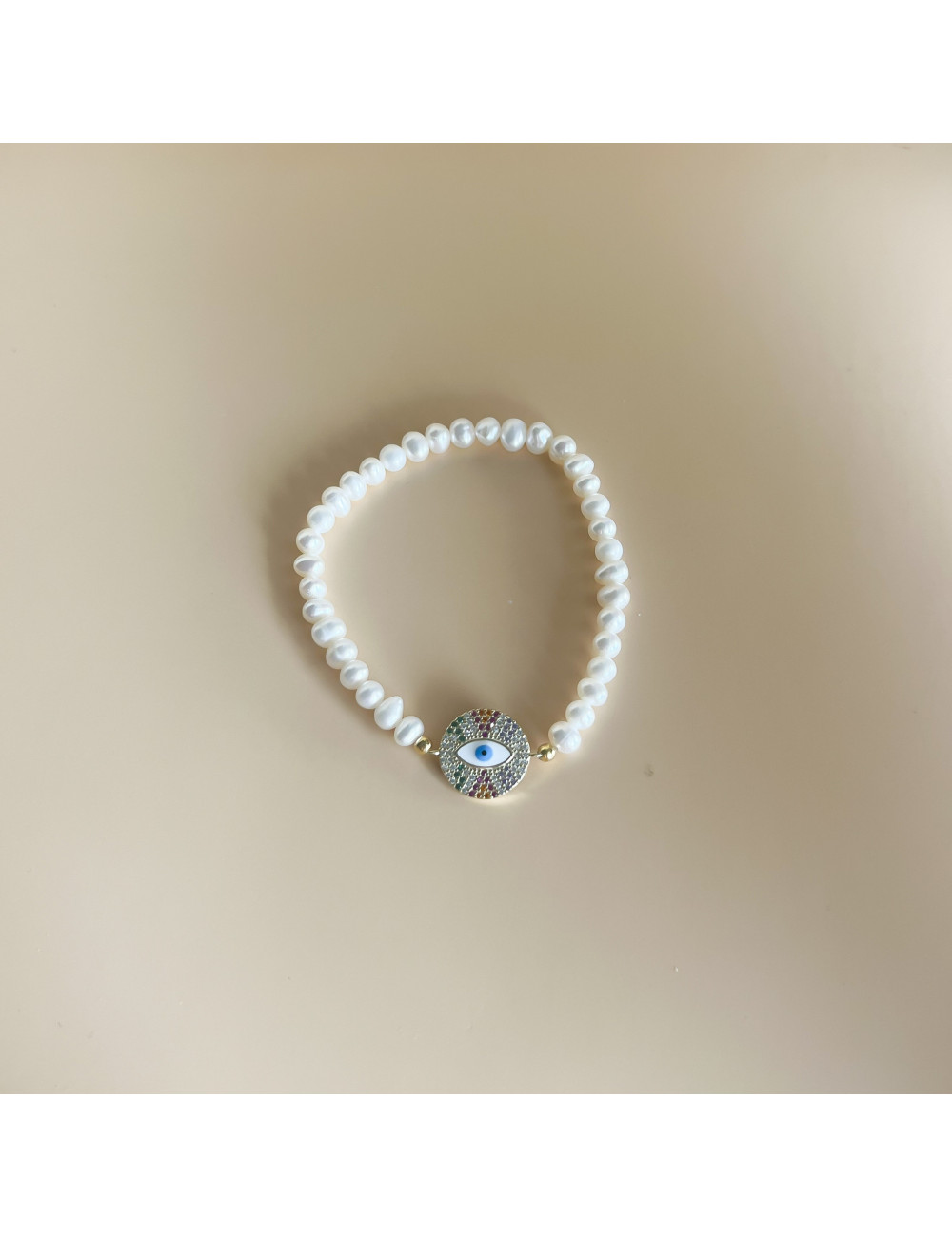 Pulseira pérolas e olho Prata dourada