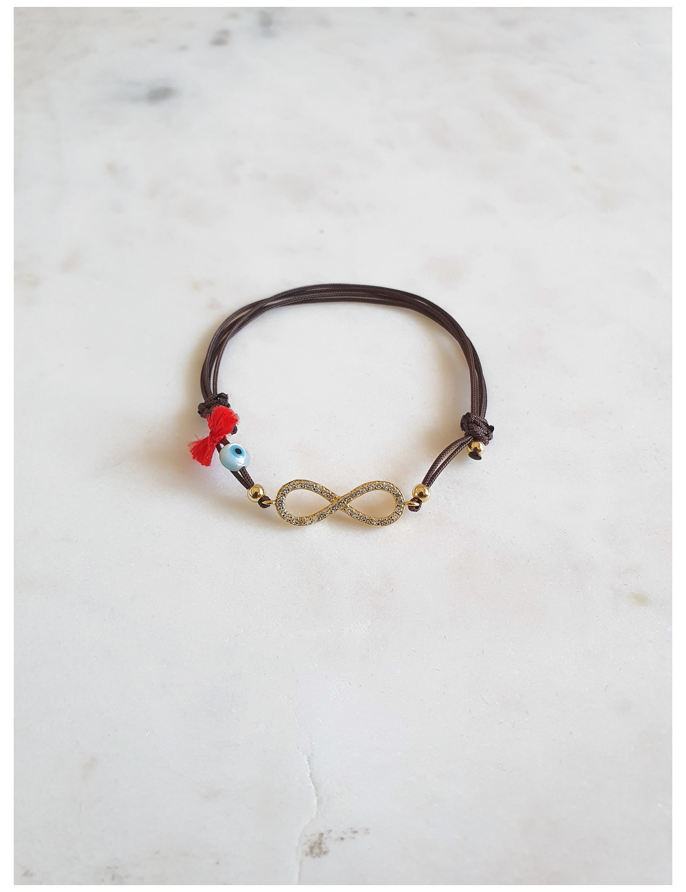 PULSEIRA EM FIO SEDA INFINITO MED PRATA DOURADA